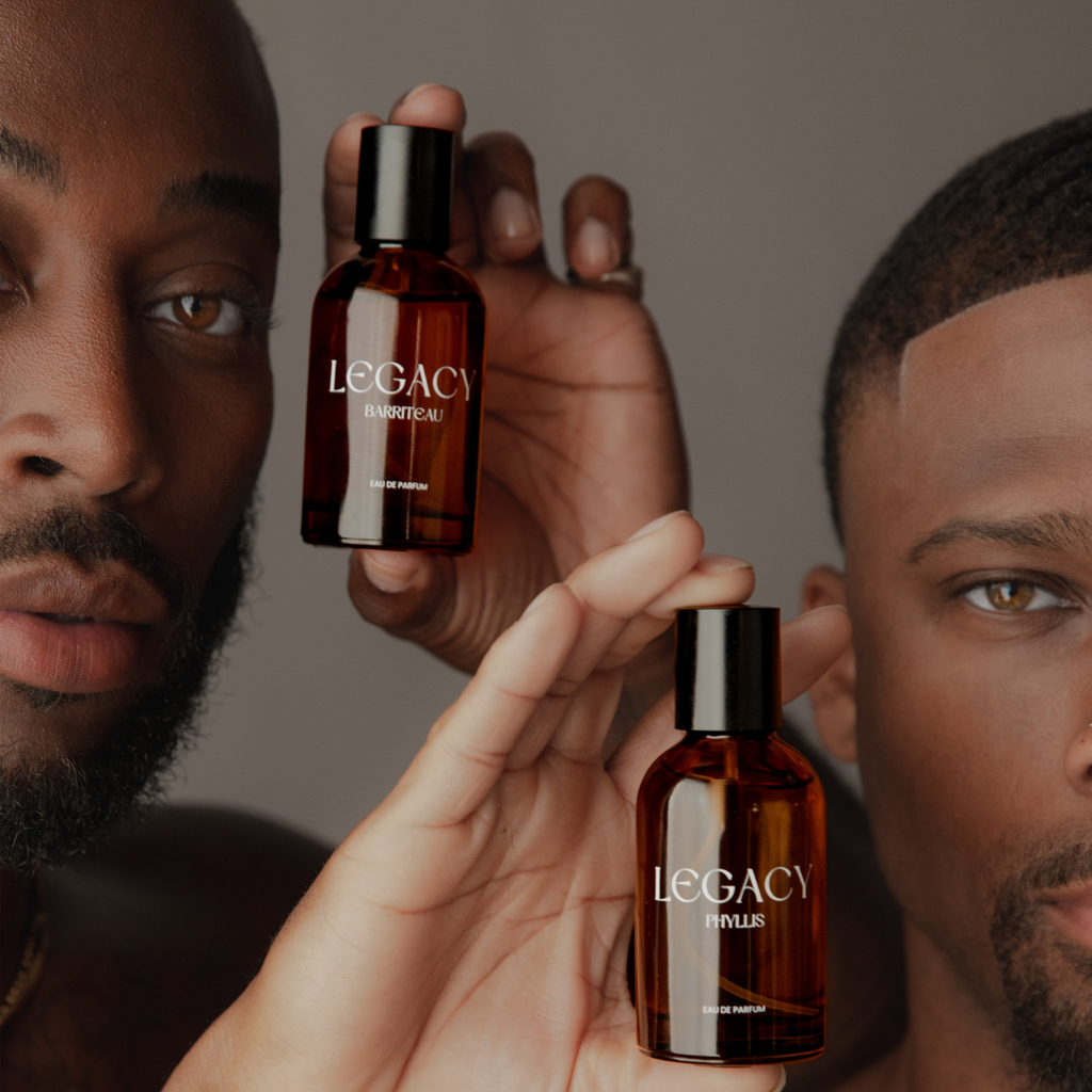 Two male models holding Legacy Fragrance